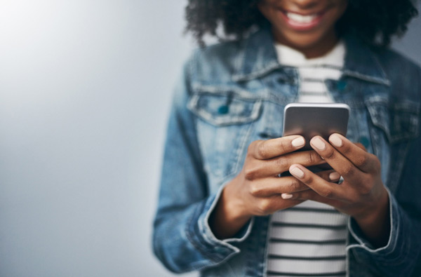 Woman looking at a website on her phone.